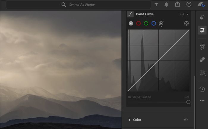 Adobe Lightroom Point Curve panel with a straight diagonal curve beside a mountain photograph
